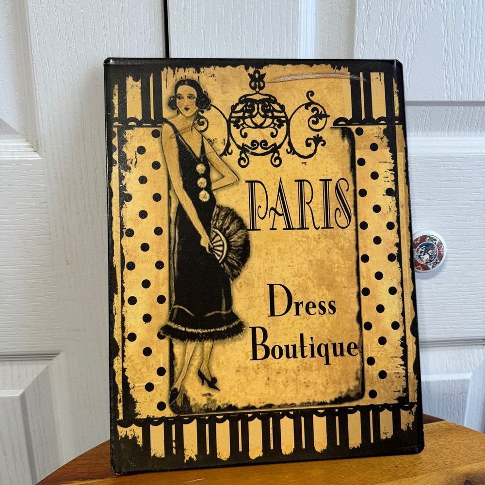 Kimberley Poloson Paris dress boutique metal wall hanger
